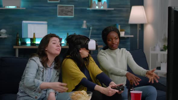 Multi Ethnic Friends Losing Video Games Using Virtual Reality Headset