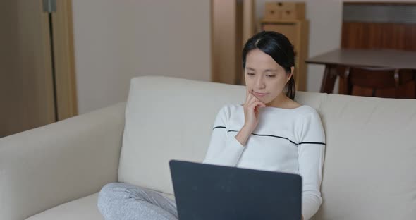 Woman work on computer at home