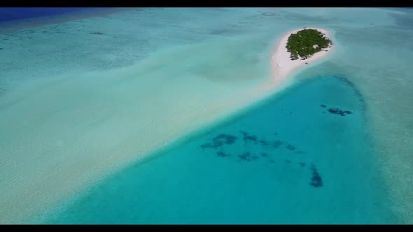 Aerial drone view landscape of luxury coastline beach voyage by blue green lagoon with white sand ba