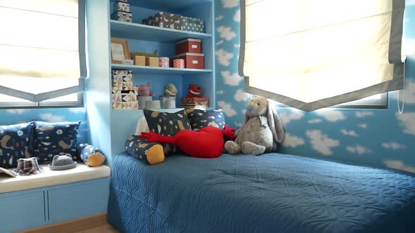 Sky Blue Bedroom For Little boy Stuffed with Toys and Dolls