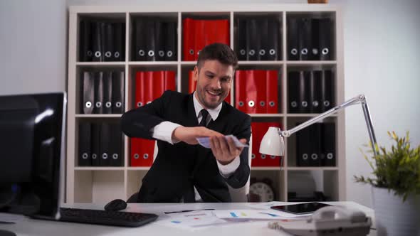 Businessman Throw Euro Bills in Air