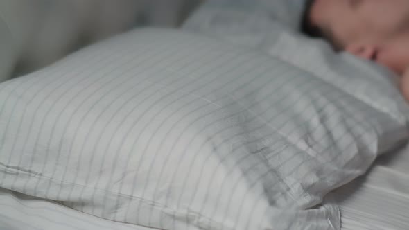 Happy Tired Man and Woman Fall Into Bed on Pillow and Sleep at Home