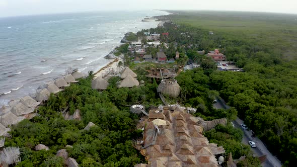 Beautiful Aerial View of the Eco Wooden Houses in the Middle of a Jungle