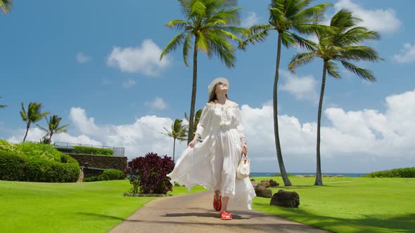Slow Motion Beautiful Smiling Woman in Flying White Dress Walking Hawaii Island