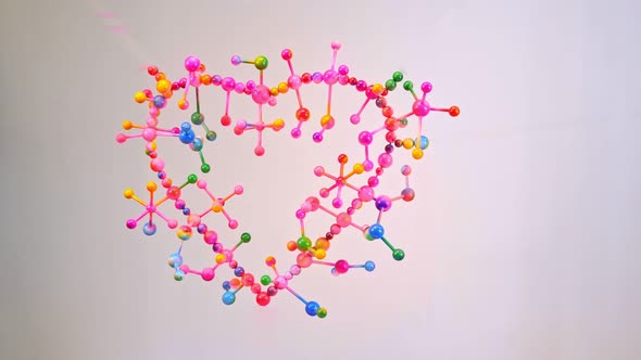 Colorful Sphere Balls With A Pink Heart On A White Background.