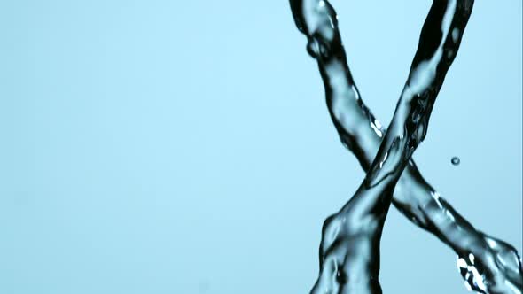 Water pouring and splashing in ultra slow motion 