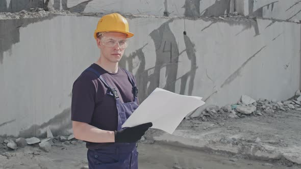 Portrait of Quarry Worker with Blueprints