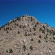 Rocky Mountain Peak w/ Trees Aerial Parallax Shot - VideoHive Item for Sale