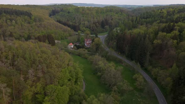 wide drone view over the valleys and mountains of the German Hesse region in the western central par