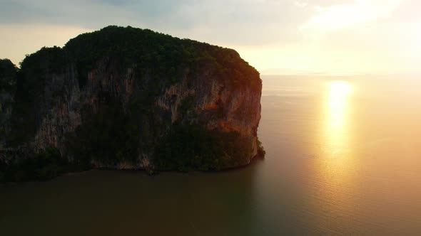 Aerial view over the coast, mountains and beaches during beautiful sunsets