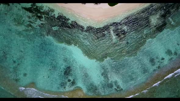 Aerial flying over texture of marine coast beach journey by blue ocean and white sand background of 