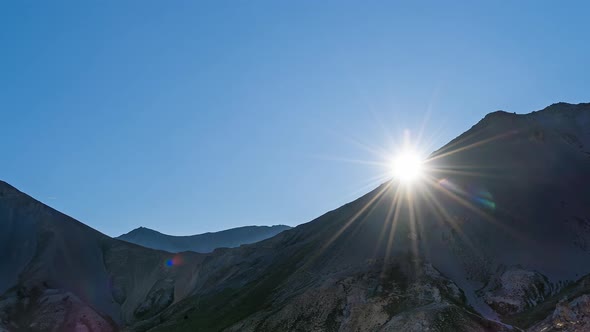 Sun Overlooking Peaks Mountains at Morning Alps