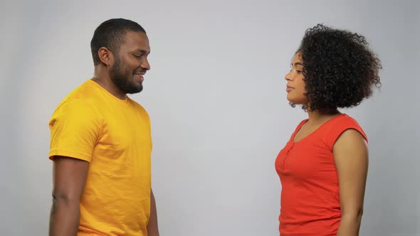 Happy African American Couple with Flowers