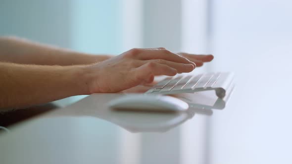 Manager Hands Typing Computer Keyboard in Office