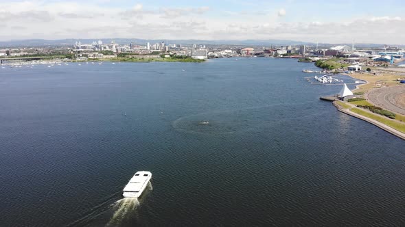 Boat Going Past In Cardiff Bay. Aerial Static