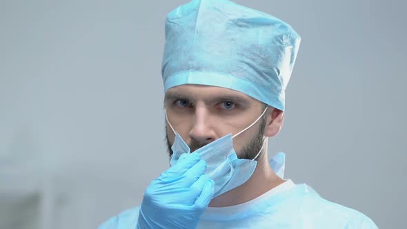 Tired Male Surgeon in Protective Uniform, Medical Profession, Qualified Doctor