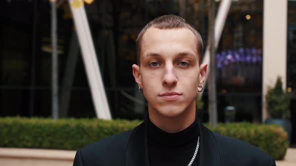 Portrait of Young Caucasian Man Smiling Outside Urban City Business Office