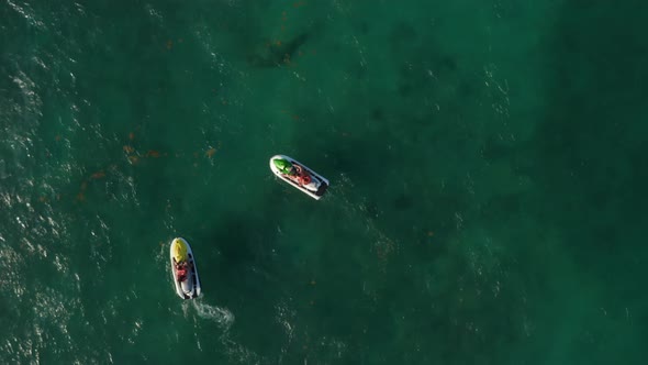 Jet Skis Floating on the Calm Water Surface