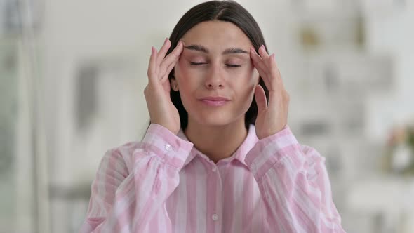 Exhausted Young Latin Woman Having Headache