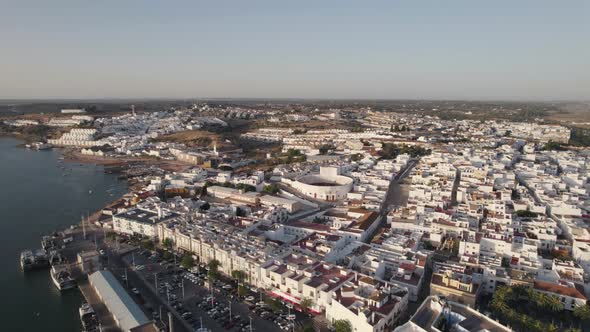 White cityscape of Ayamonte town in Spain, aerial fly over view