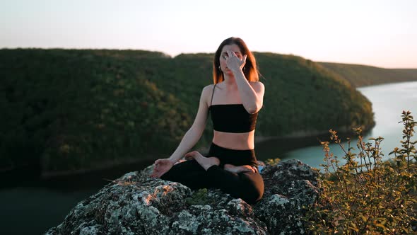 Young Woman Doing Yoga Belly Exercise  Kapalabhati Yogic Breathing Technique