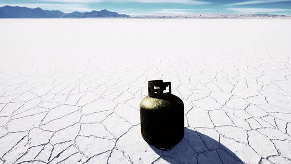 Old Rusted Danger Gas Container on Salt Lake