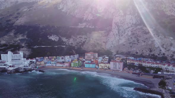 Sunlight Through Seaside Town Of Catalan Bay In Gibraltar. Aerial Shot