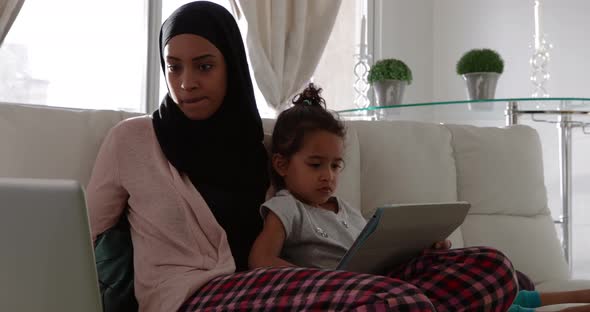 Mother and daughter at home