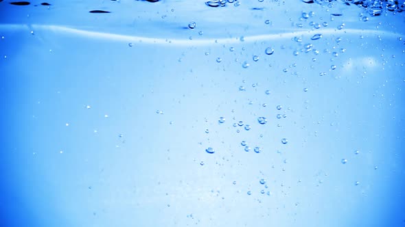 Many Bubbles in Water Close Up Abstract Water Wave with Bubbles in Slow Motion