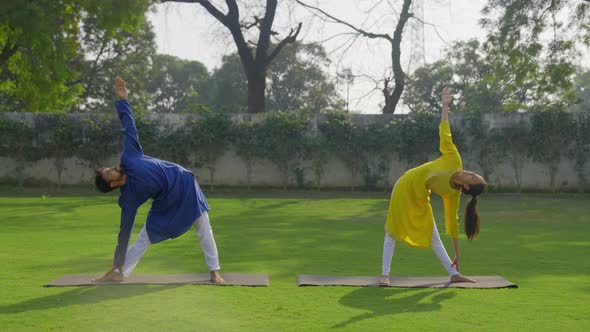 Indian couple doing stretching