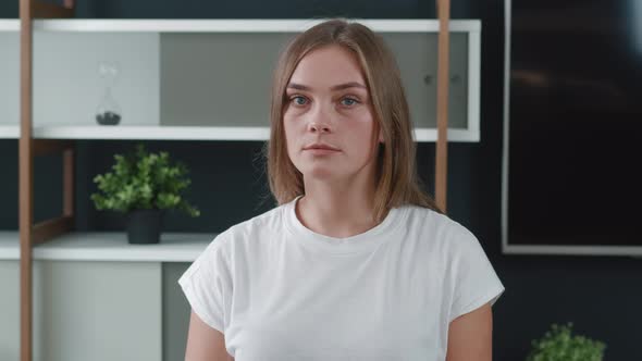 Portrait of Shocked Woman Putting Hands on Face. Frightened Terrified Caucasian Young Female Looking