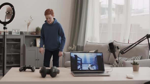 Red-haired Blogger Dancing for Video Post