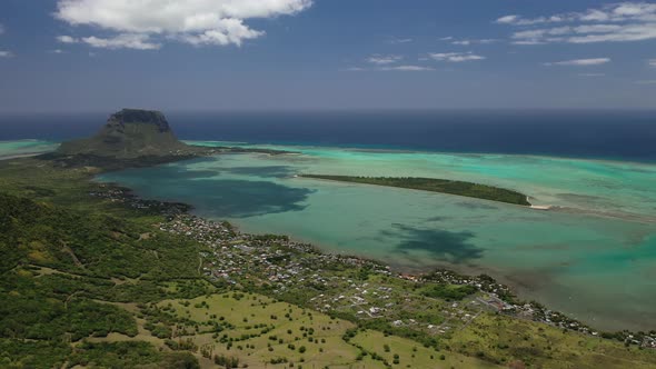 Beautiful bird's-eye view of mount Le Morne Brabant and the waves of the Indian ocean in Mauritius