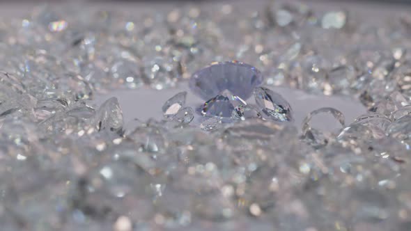 The Sparkling Sparkle Of Diamonds Surrounded By White Diamonds And Spinning Around.