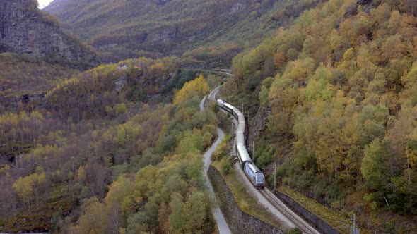 The Flam to Myrdal Train Passing Through Beautiful Landscapes