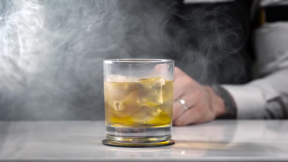 Spectacular Whisky Serve. The Bartender Made a Smokescreen Around the Drink.