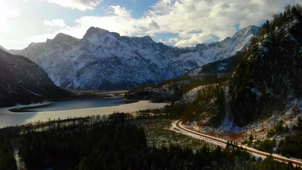 Beautiful Landscape with Mountains, forest and an Lake in Winter