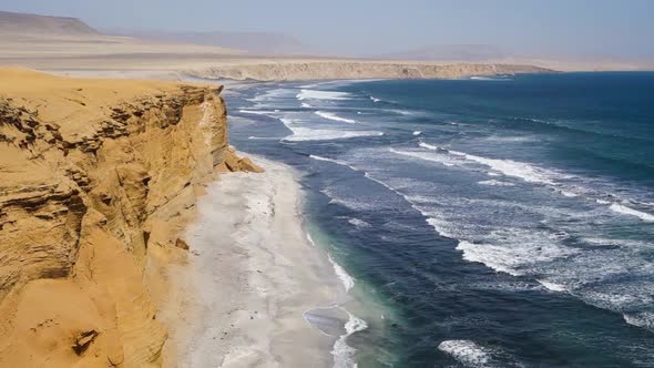 Cliffs and sea in Paracas National Reserve. Arid touristic zone in the coast of Ica/Peru. Static wid