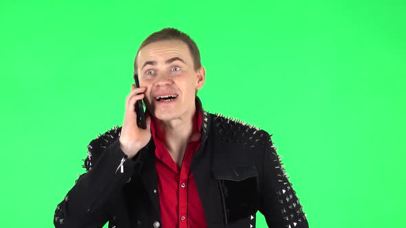 Guy Talking for Mobile Phone, Very Shocked Then Rejoice. Green Screen