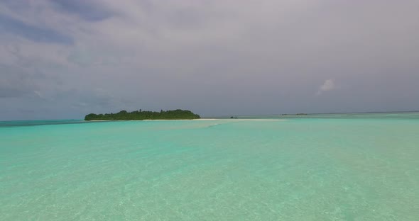 Natural overhead travel shot of a white paradise beach and blue ocean background in best quality 4K