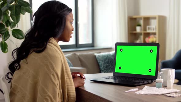 Sick Woman Having Video Call on Laptop at Home