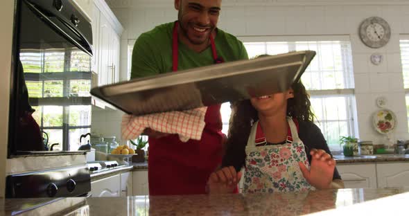 Family making Christmas cookies at home 4k