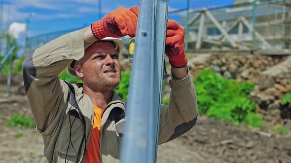 Construction site workers. Builder worker installing at construction site