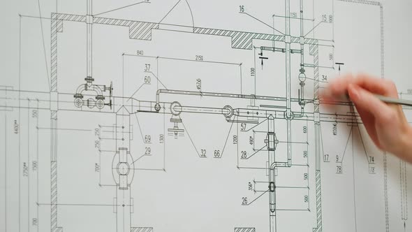 Architect Designer Working with Plan Blueprint Closeup
