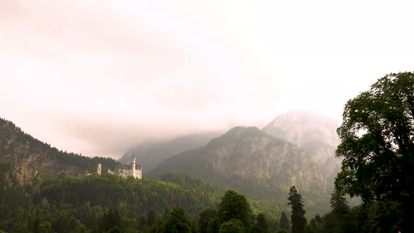 Neuschwanstein Castle in misty day, Bavaria in Germany. Zoom in