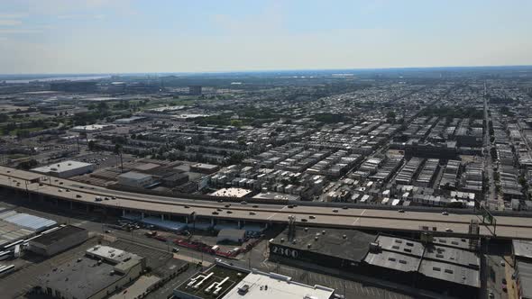 Overhead Aerial View of the Suburban Area in the Shopping Plaza District with Cars Parking of