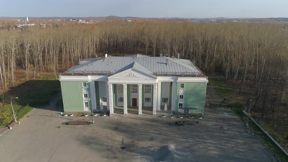 Aerial view of House of culture with columns with light green walls 02