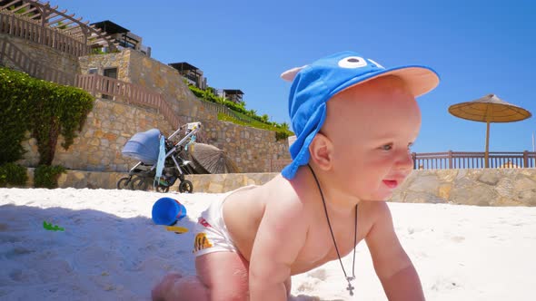 Emotions of a Little Happy Boy Who Is on the Beach for the First Time with Mom