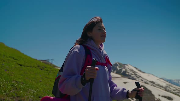 Happy Tourist at Top of Mount Woman is Breathing Fresh Air and Enjoying Landscape