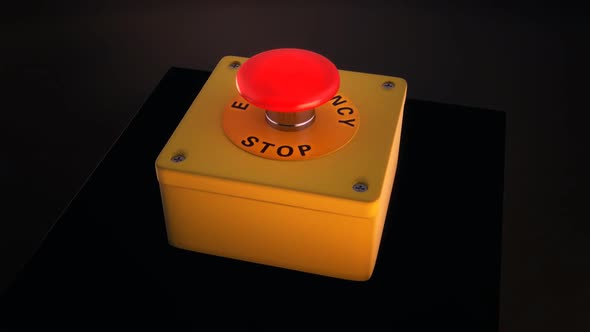 Red button with the 'Emergency stop' words on the panel. Red light is flashing.